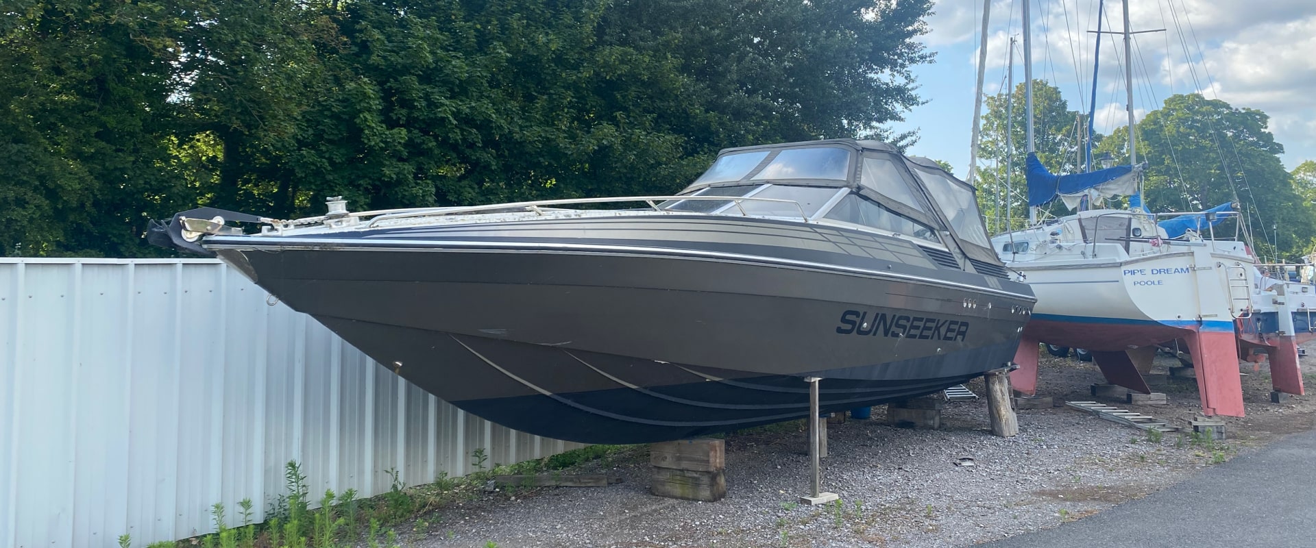 Boat in a boatyard with a rubber D fender