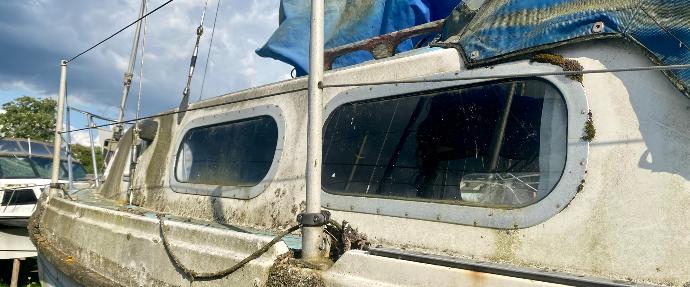 Boat in a boatyard with a fixed aluminium window frames