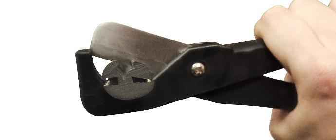 A cutting tool cutting a rubber seal